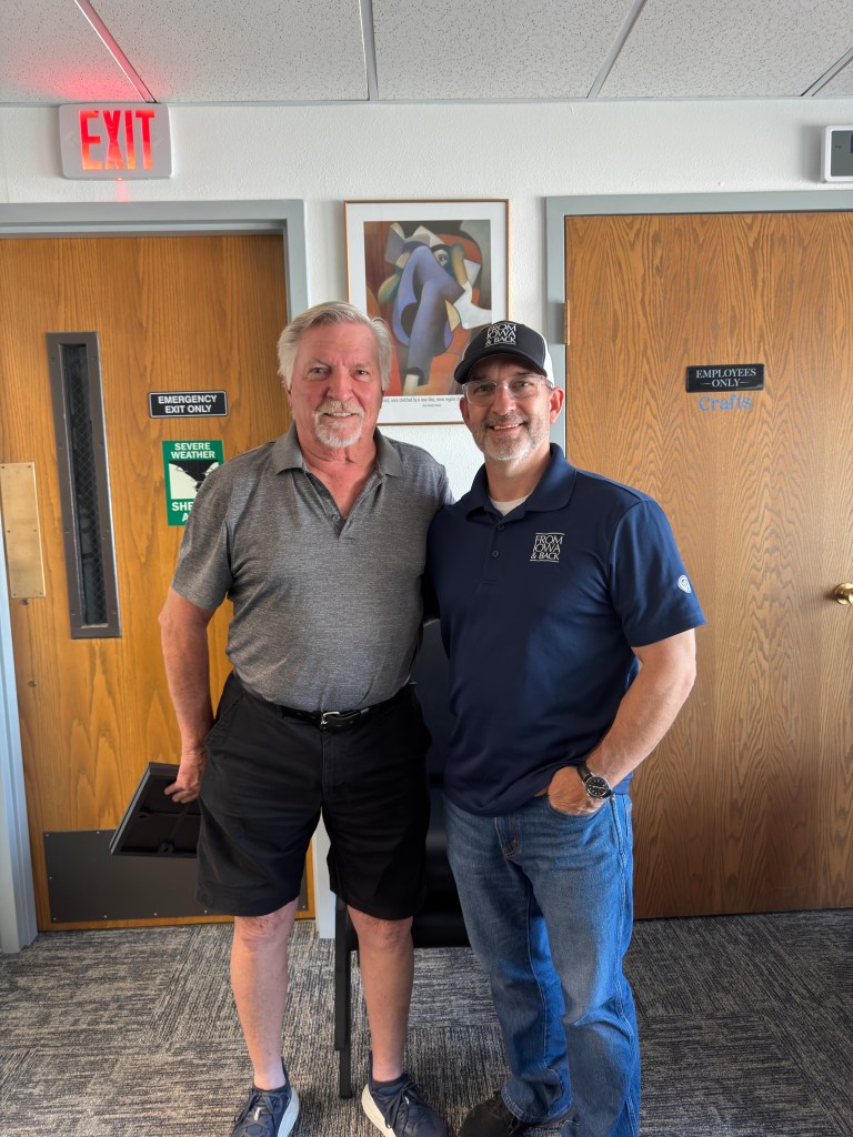 Vietnam-era veteran Gene Schutte with Jeremy Glazier at the La Porte City Library in La Porte City, Iowa.