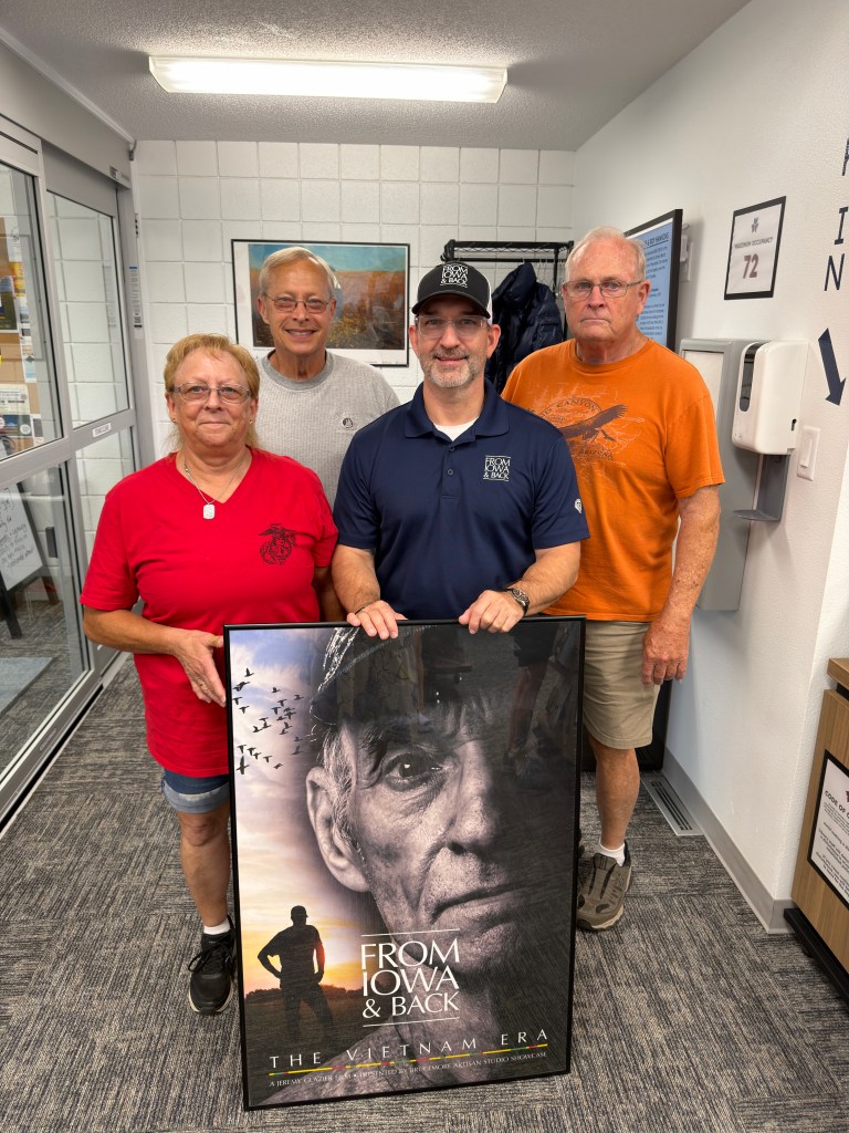 Terry Sides, Dennis Runyan, Jeremy Glazier and Gary Scheffler at the La Porte City Library in La Porte City, Iowa.