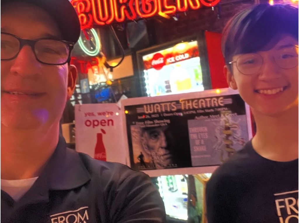 Jeremy Glazier and his son James at Teluwut Grille House & Pub in Osage, Iowa, during the From Iowa and Back screening trip.